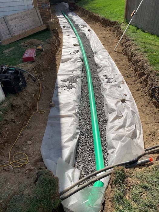 exterior french drain services - waterproofing solutions at on top masonry and construction